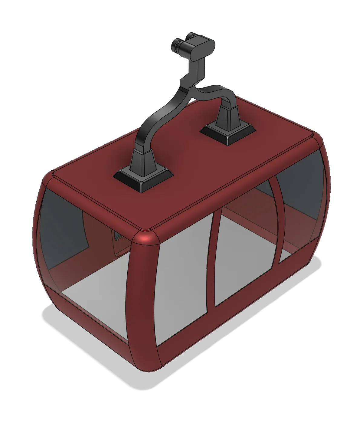 Red cable-car cabin with glazed panels and a dark hanger arm and grip on the roof