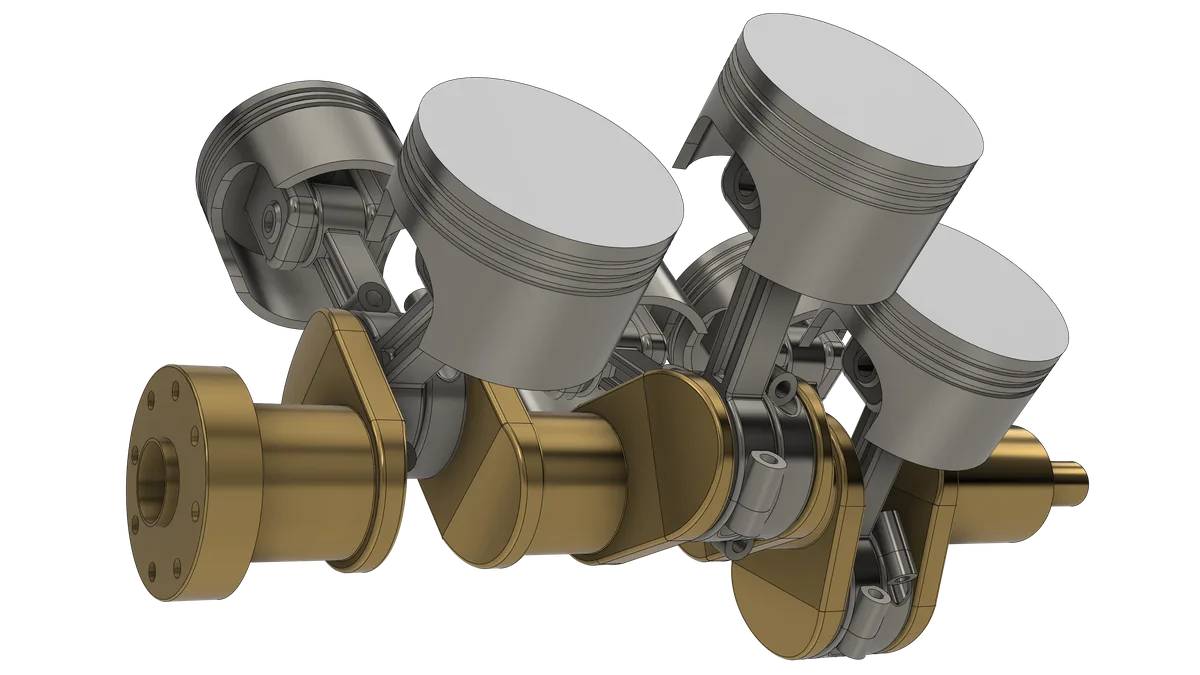 The crankshaft with its drilled flange, connecting rods and six pistons with ring grooves
